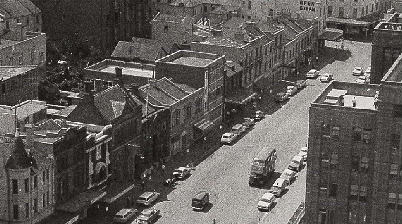 117 119 George St centre of picture a 1955 building in a largely Victorian streetscape 1960 Photo by Val Sowada PMNSW Collection
